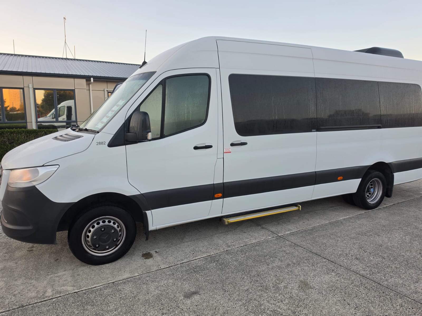 White Mercedes-Benz Sprinter group shuttle van